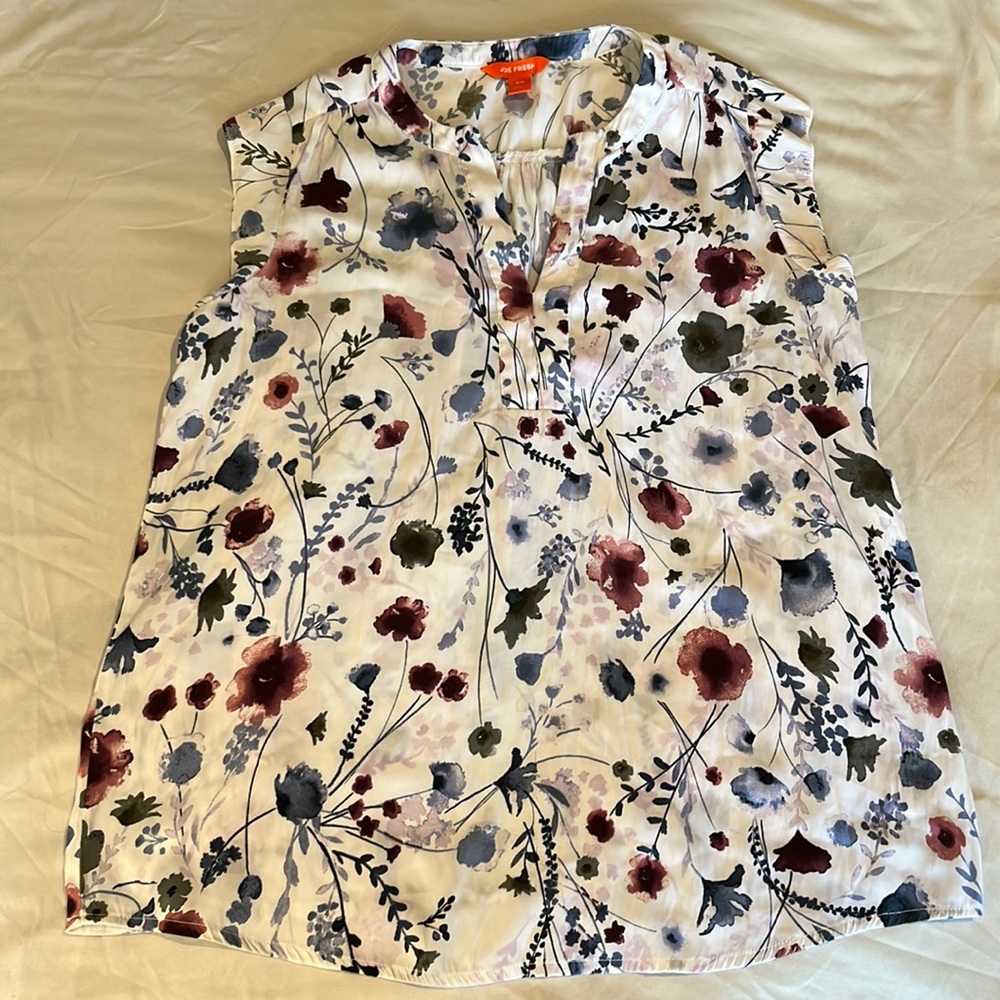 White floral sleeveless blouse